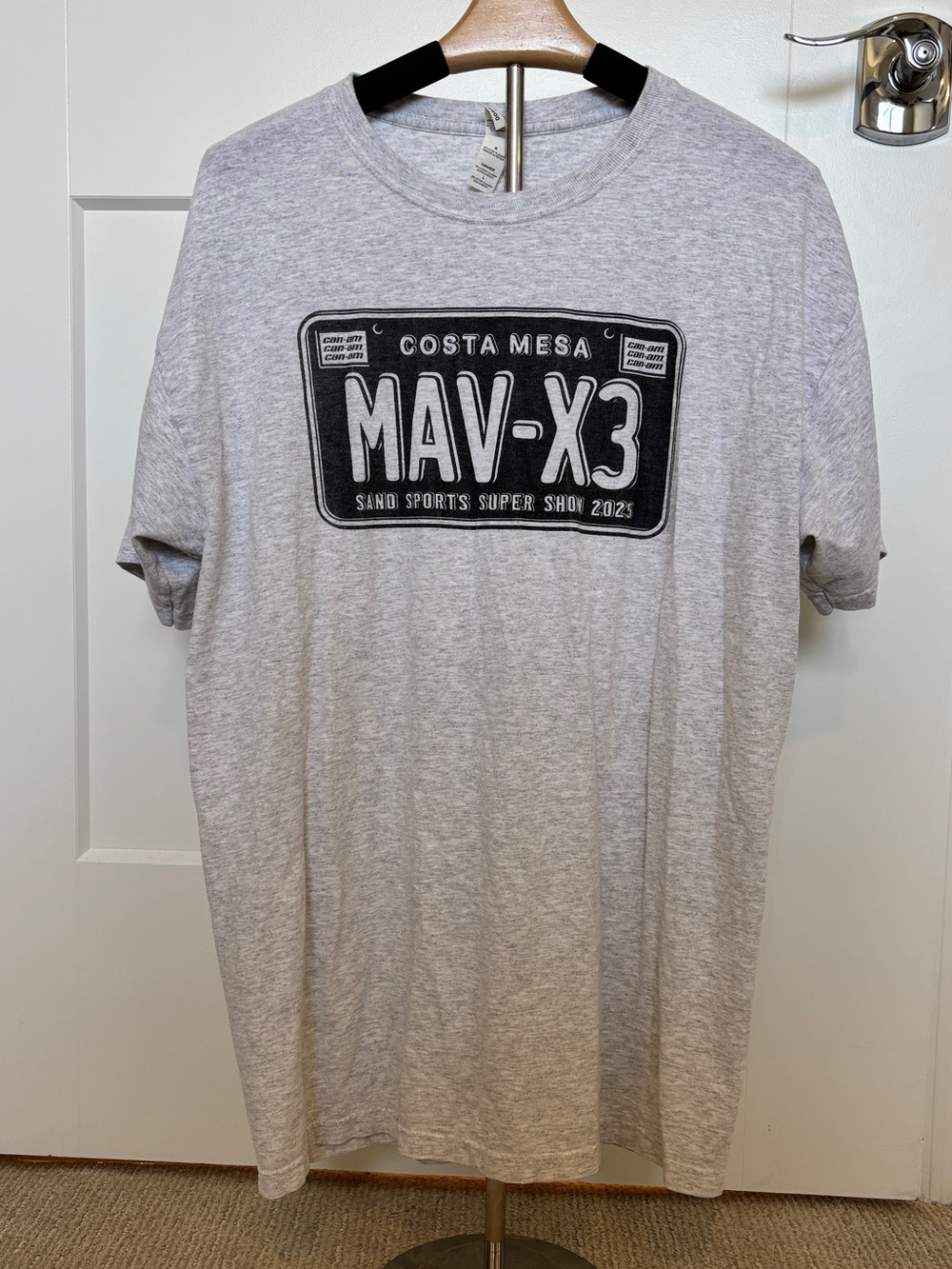 Gray t-shirt featuring a "Costa Mesa" "MAV-X3" "Sand Sports show 2025